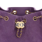 Suede Quilted Mini Chanel 25 Handbag Purple