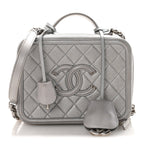 Metallic Caviar Quilted Medium CC Filigree Vanity Case Silver