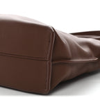 X SUNA FUJITA Nappa Flamenco Knot Clutch Havana