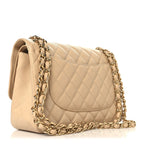Caviar Quilted Jumbo Double Flap Beige Clair