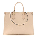 Empreinte Monogram Giant Onthego MM Creme