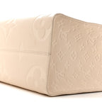 Empreinte Monogram Giant Onthego MM Creme