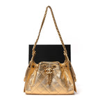 Metallic Caviar Quilted Mini Chanel 25 Handbag Gold