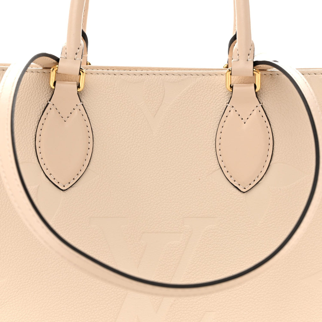 Empreinte Monogram Giant Onthego MM Creme