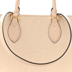Empreinte Monogram Giant Onthego MM Creme