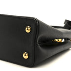 Taurillon Capucines PM Black Fuchsia