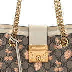 GG Supreme Monogram Berry Textured Dollar Calfskin Small Padlock Tote Beige Ebony Light Copper Mystic White
