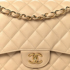 Caviar Quilted Jumbo Double Flap Beige Clair