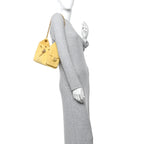 Suede Quilted Mini Chanel 25 Handbag Yellow