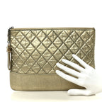 Metallic Aged Calfskin Quilted Medium Gabrielle Cosmetic Case  Gold
