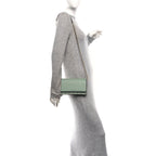 GG Supreme Monogram Textured Calfskin Emblem Wallet On Chain Sage Green