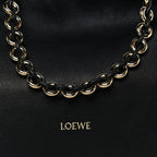 Mellow Nappa Medium Donut Chain Flamenco Knot Clutch Black