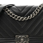 Caviar Chevron Quilted Medium Boy Flap Black