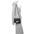 Caviar Quilted Small Boy Flap Black