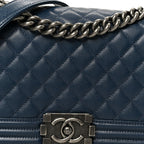 Caviar Quilted Medium Boy Flap Dark Navy Blue