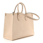 Empreinte Monogram Giant Onthego MM Creme